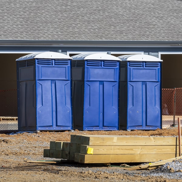 how often are the portable toilets cleaned and serviced during a rental period in Rhodes